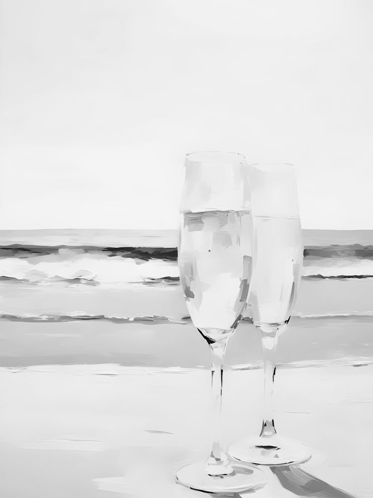 Two Glasses Of Champagne On The Beach