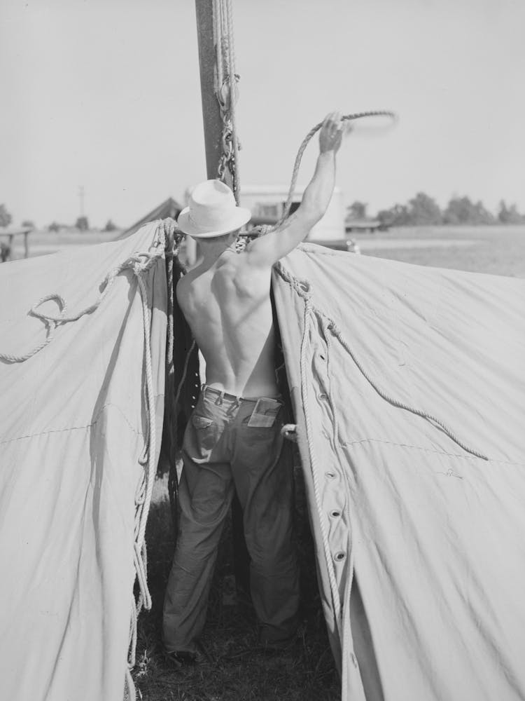 Member Of Carnival Crew At Work, Lasses White Traveling Show, Sikeston, Missouri By Russell Lee