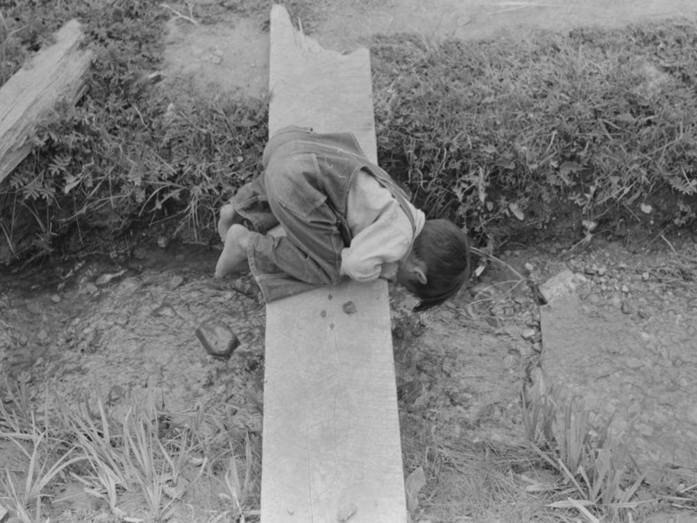 Untitled Photo, Possibly Related To Spanish American Boy Playing In Irrigation Ditch, Chamisal, New Mexico