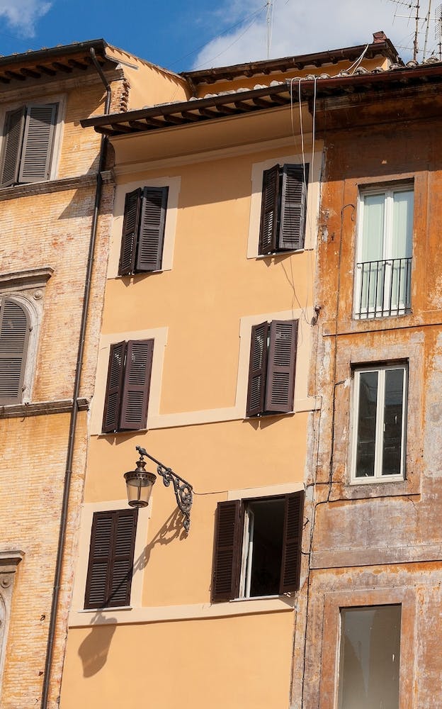 Beautiful Street Scene Of The Old Orange Houses In Rome Italy