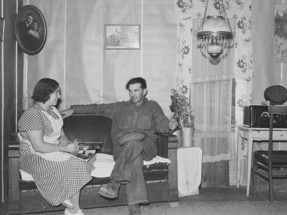 Parents Talking Over Problems In One Of The Better Homes, Williams County, North Dakota By Russell Lee