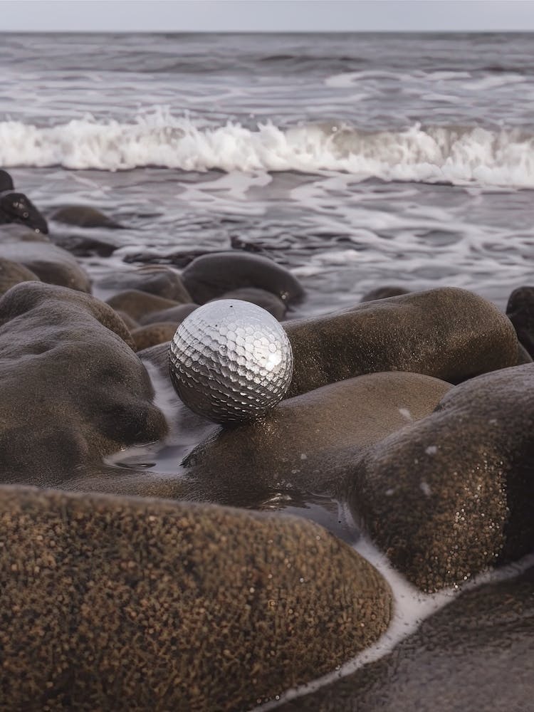 Disco Ball On The Shore Photo 0