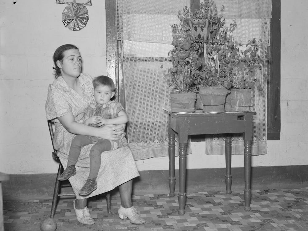 Mother And Child In Home Near Williston, North Dakota By Russell Lee