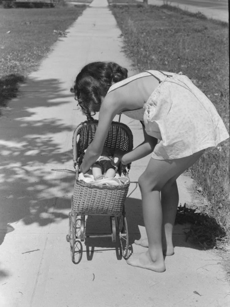 Little Girl Plays With Her Doll, Caldwell, Idaho By Russell Lee