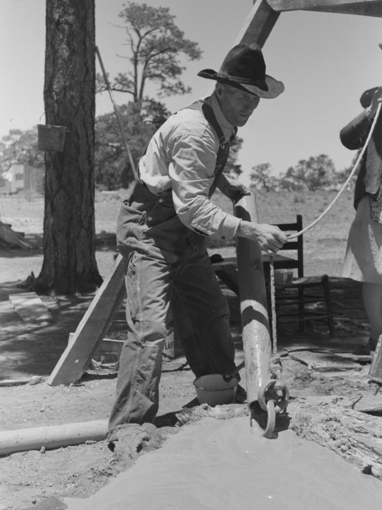Farmer Emptying Slush From Well Which He Is Drilling With Cable Tools, Pie Town, New Mexico By Russell Lee