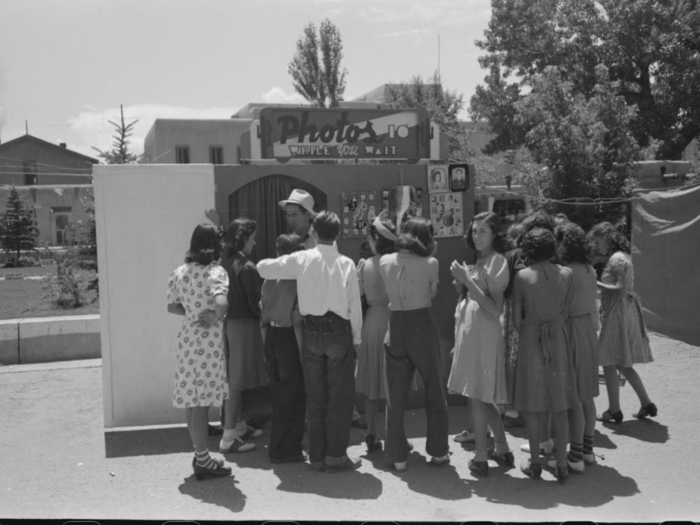 Many People Had Quick Photos Taken At The Fiesta, Taos, New Mexico By Russell Lee