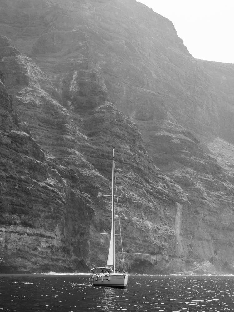 Sailboat in front of the Los Gigantes cliffs, Tenerife, Canary Islands