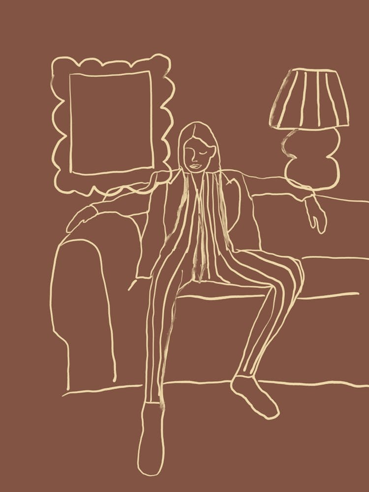 Woman Sitting On A Couch