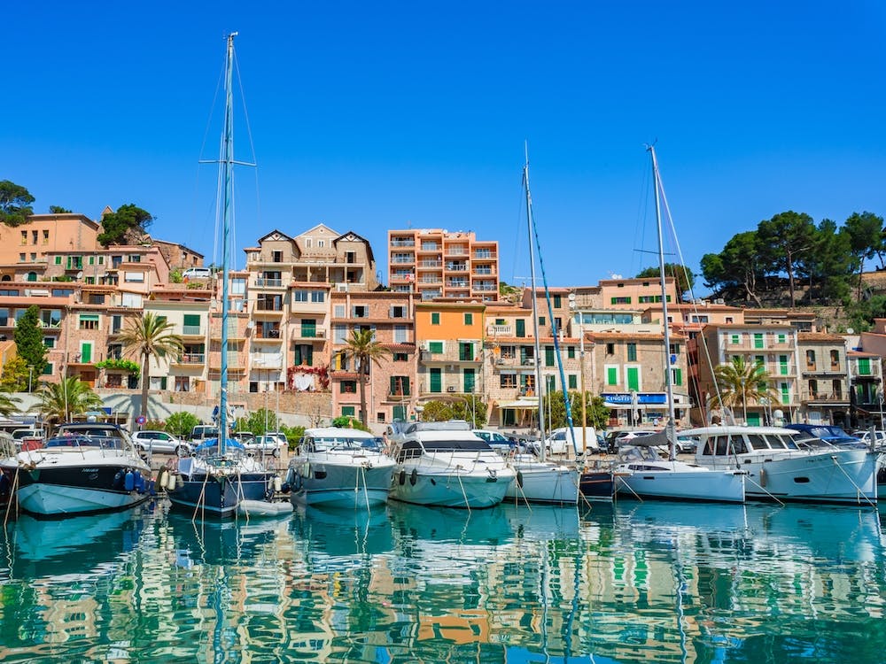 Boats yachts at marina harbor of Port de Soller on Mallorca island, Spain Mediterranean Sea