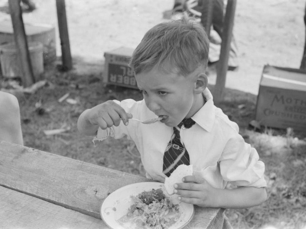Youngster Eating Dinner At All Day Community Sing, Pie Town, New Mexico By Russell Lee