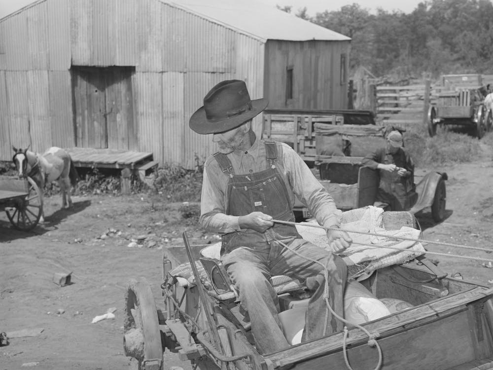 Farmer With Loaded Wagon Leaving Town, San Augustine, Texas By Russell Lee