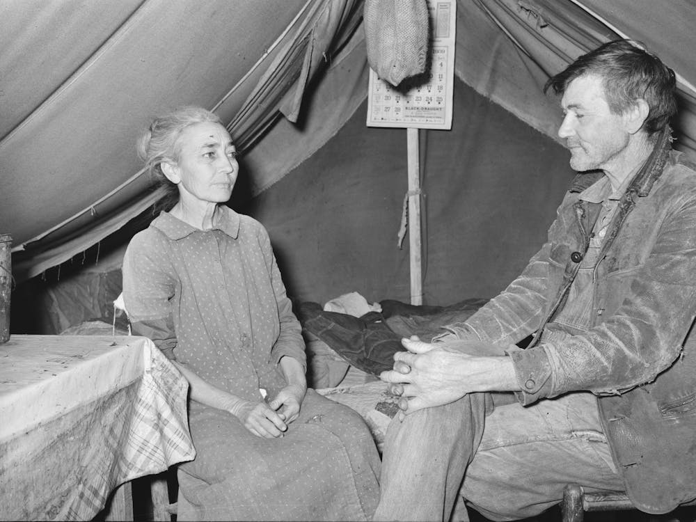 White Migrant And His Wife In Camp Near Sebastian, Texas, Both Are West Texans Who Have Come To The Valley For The
