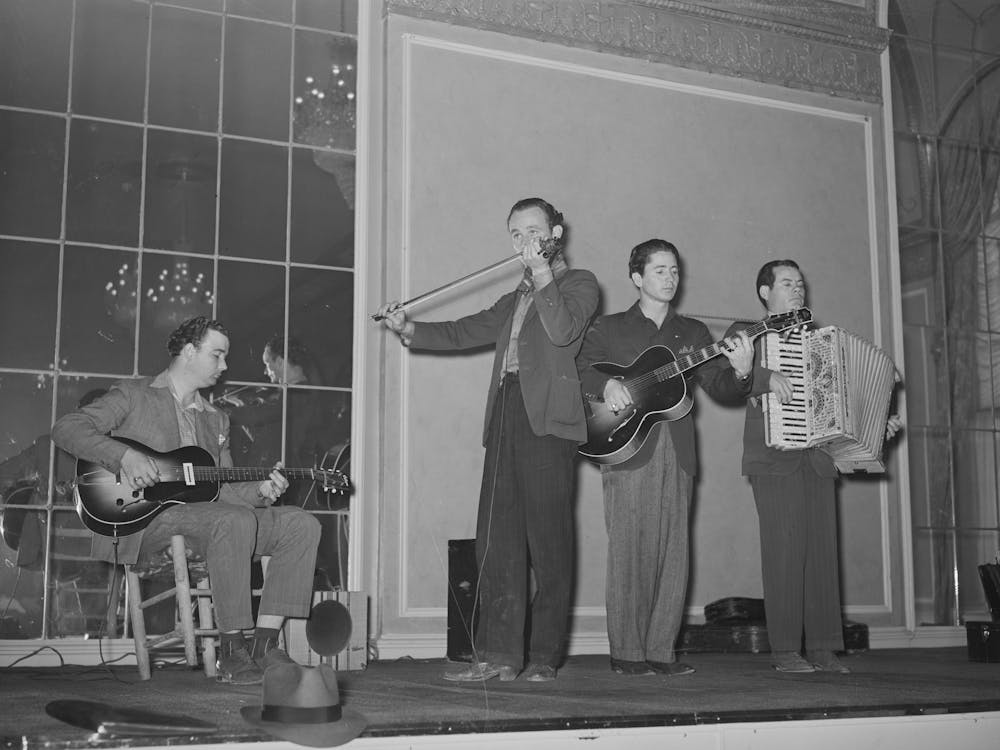 Orchestra Playing At Chamber Of Commerce Luncheon, San Angelo, Texas By Russell Lee