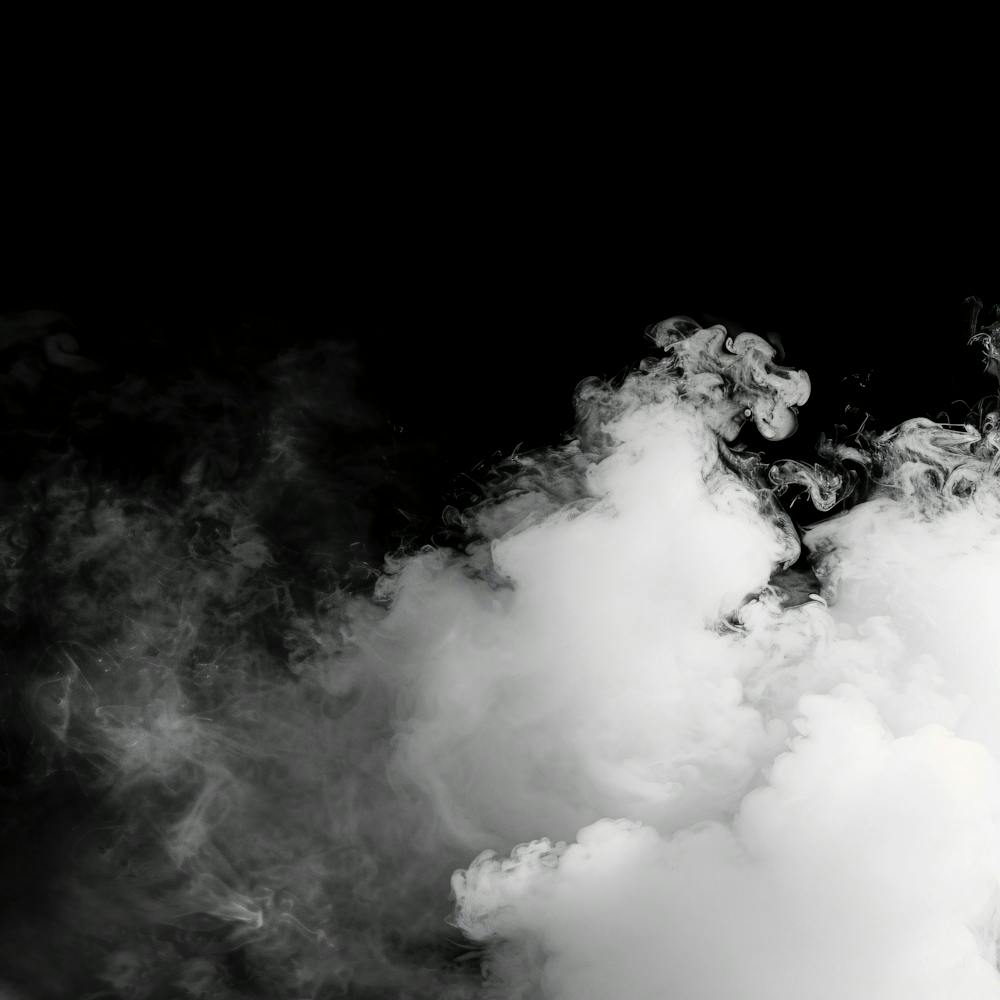 White Smoke On Black Background With Copy Space E14