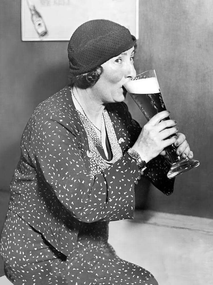 Woman Drinking Beer, Black and White Vintage Photo