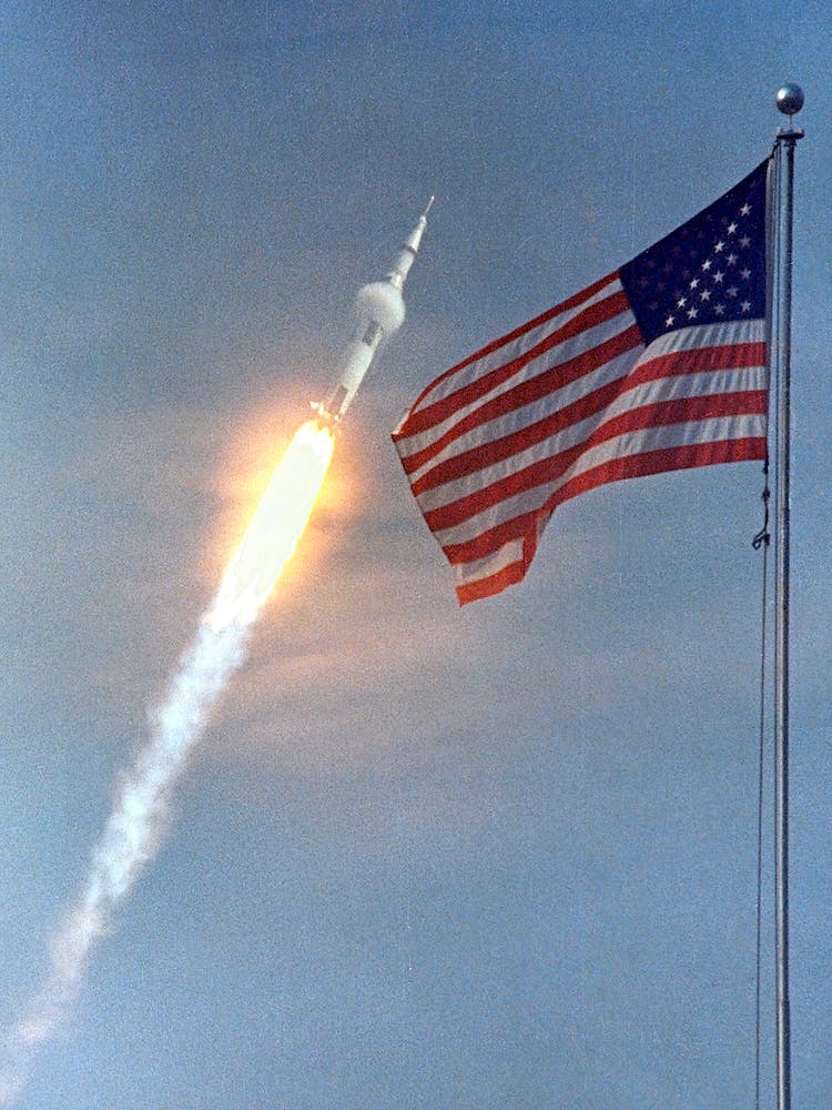 The American Flag Heralds The Flight Of Apollo 11, Man S First Lunar Landing Mission