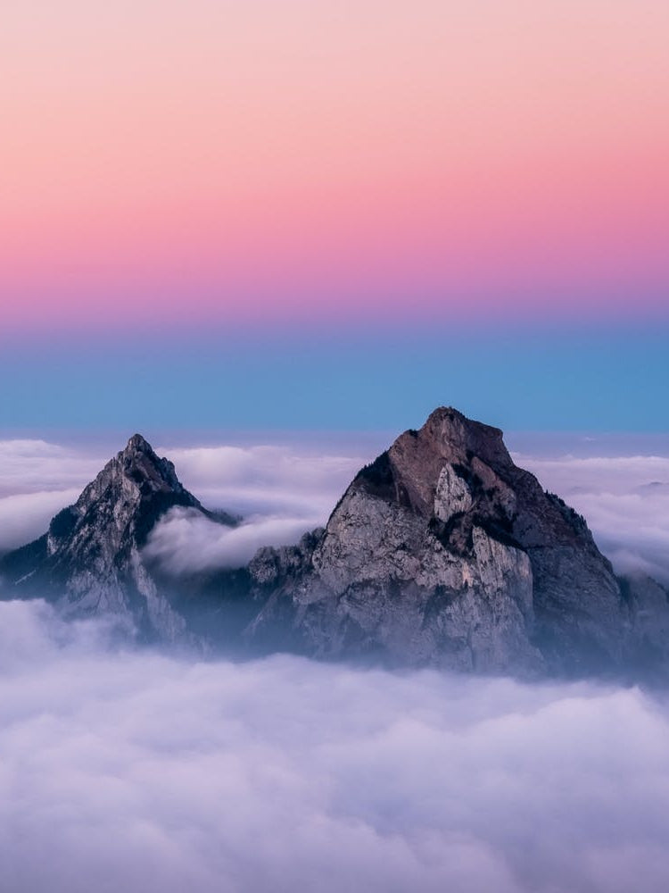 The tops of the moutains above the clouds