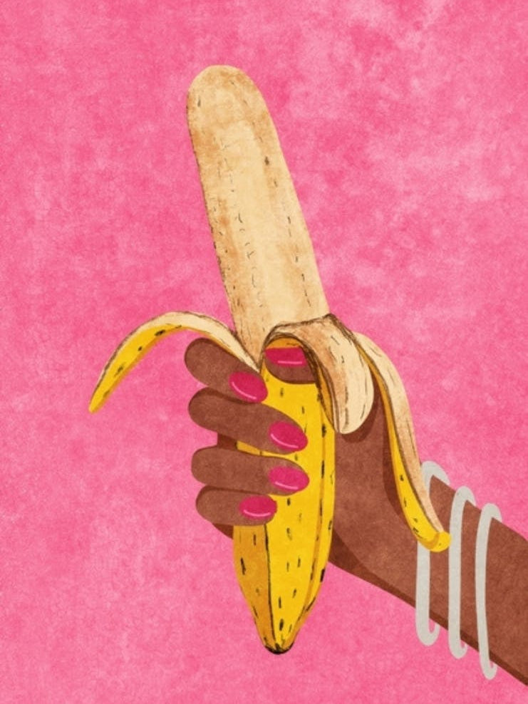 Hand Holding A Banana