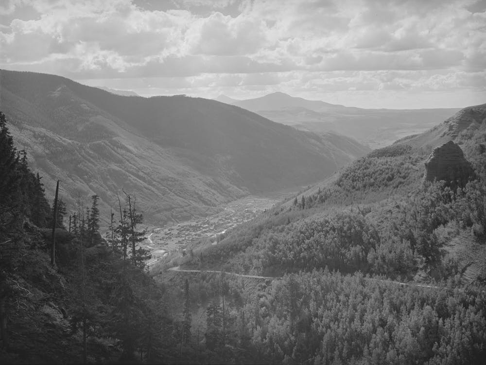 Telluride, Colorado Is Situated In A Mountain Valley By Russell Le