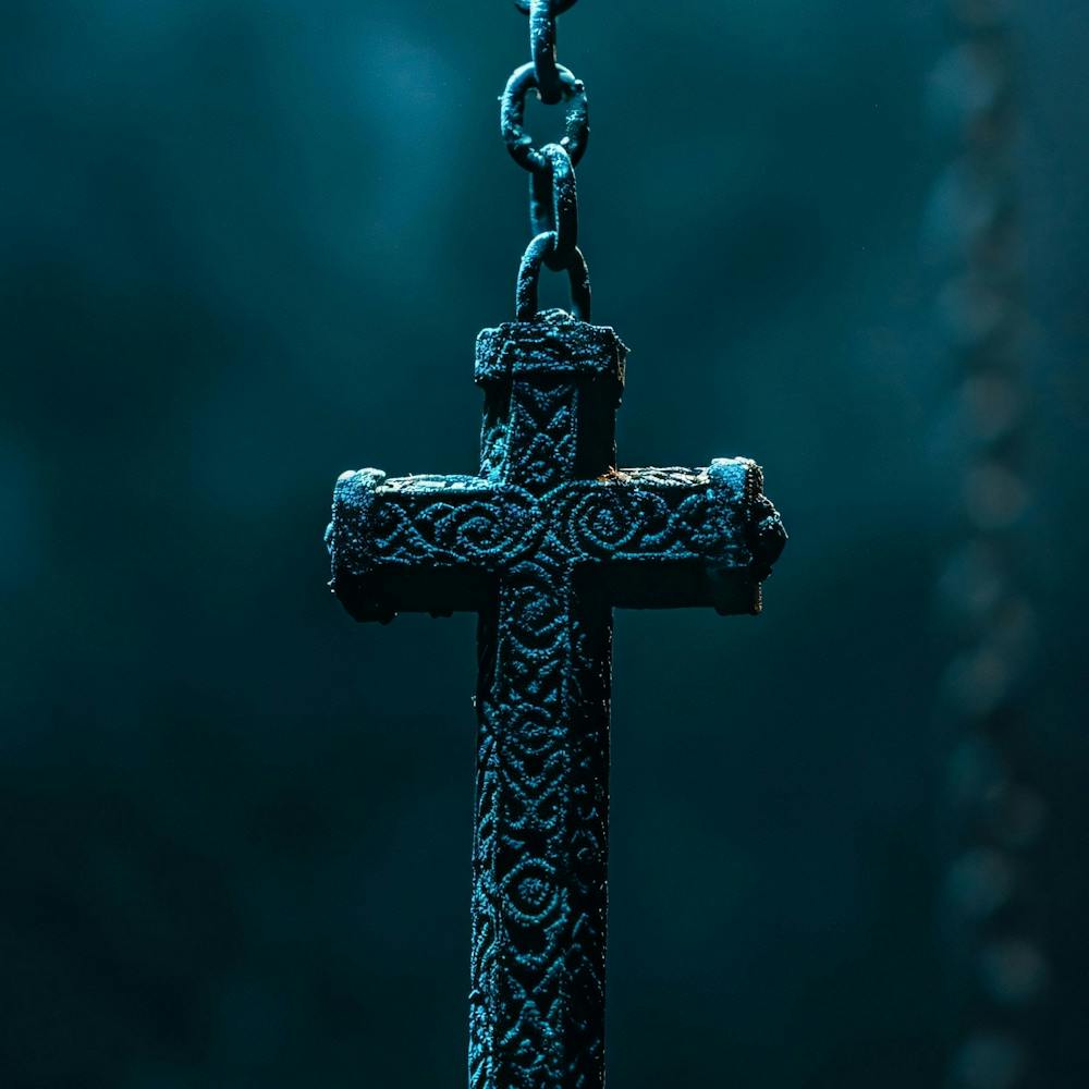 Cross Hanging From Chain