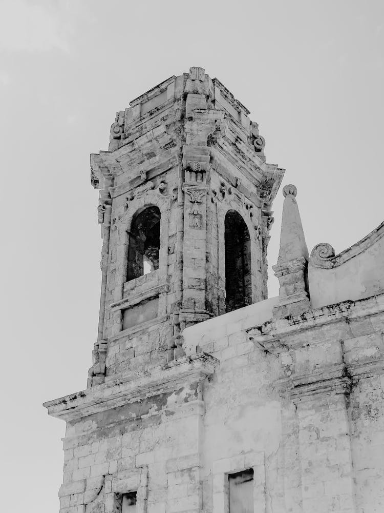 Black and white Church Tower, historic building in Monopoli, Puglia, Italy - architecture and travel photography