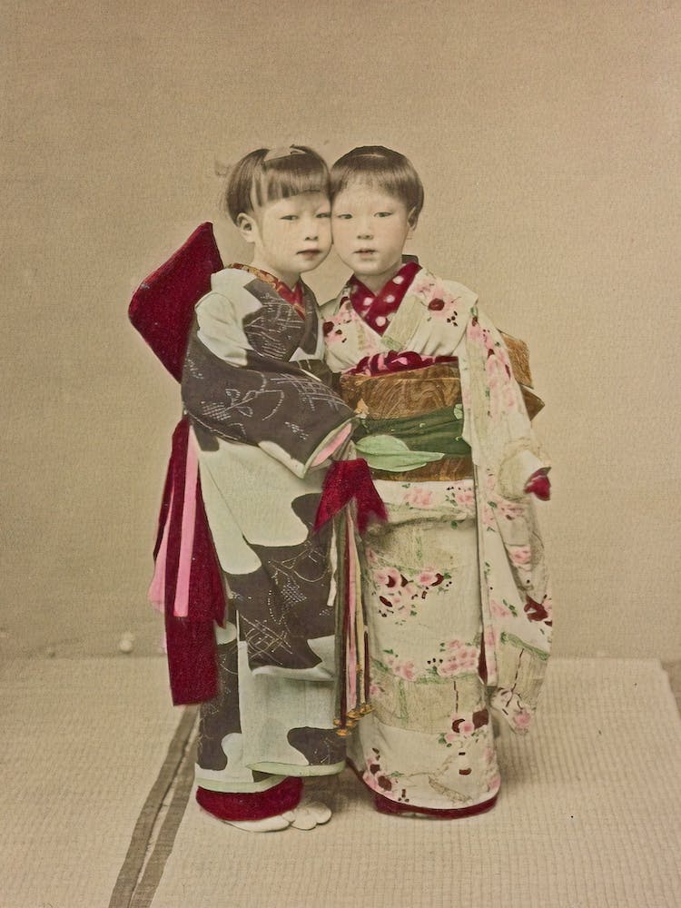 Two Children In Traditional Japanese Clothes