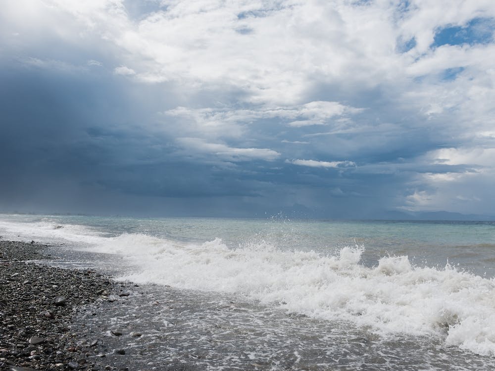 Storm Clouds Over The Beach