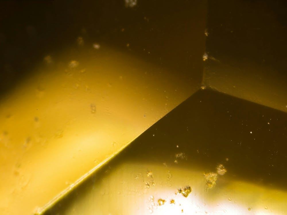 Yellow Gem Under The Microscope
