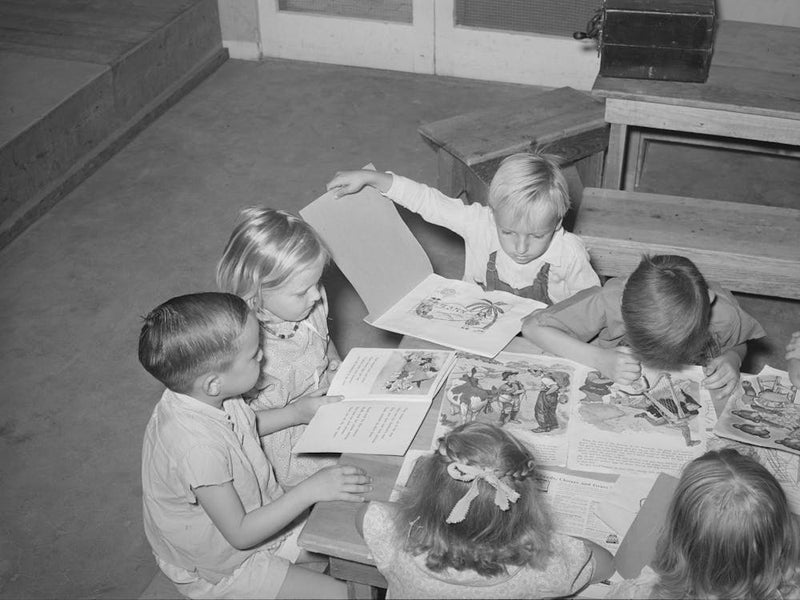 Children Looking At Picture Books At The Wpa (Work Projects Administration) Nursery School At The Casa Grande