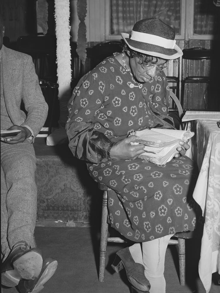 Reading The Bible In The Storefront Baptist Church,Chicago, Illinois By Russell Lee