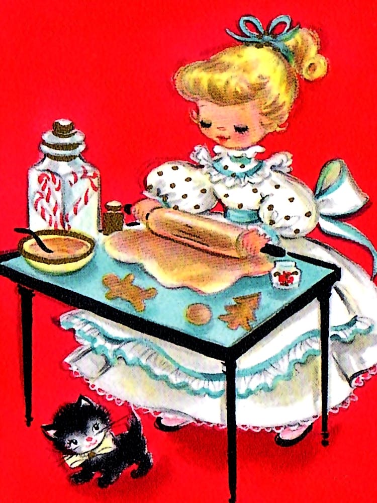 Little Girl Is Making A Christmas Cakes With Her Little Cat