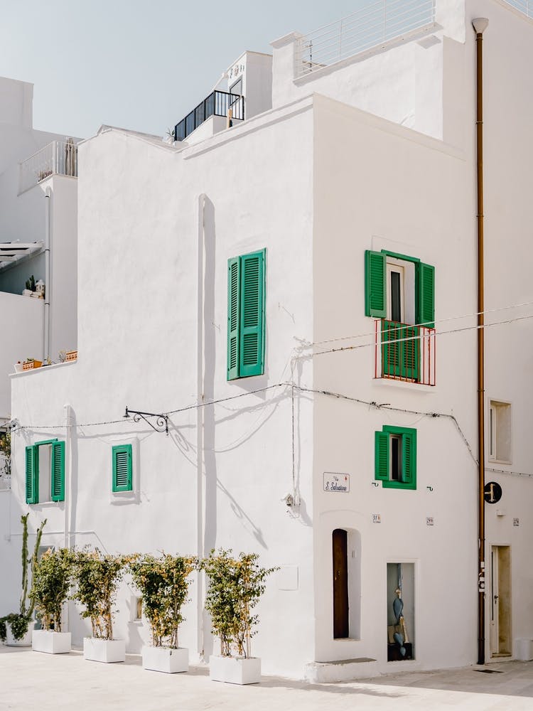 White House With Green Shutters in Monopoli, Puglia, Italy - architecture and travel photography