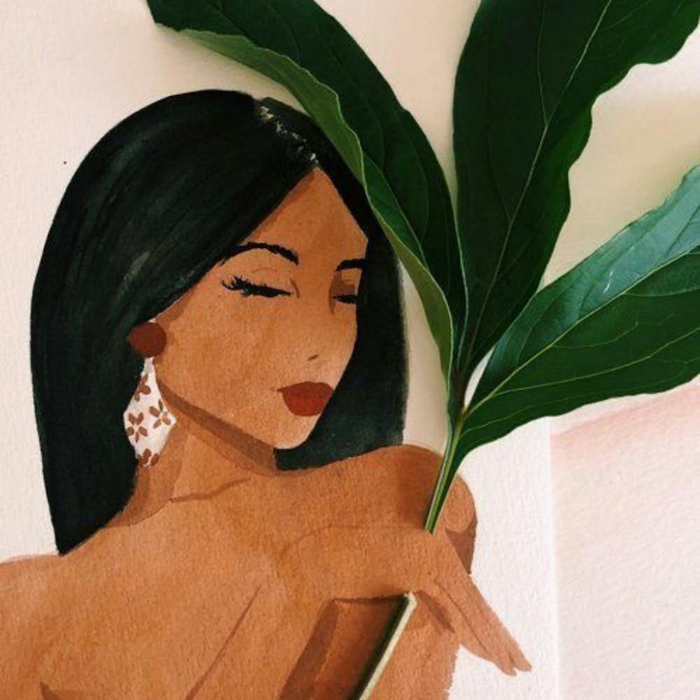 Of A Woman Holding A Leaf