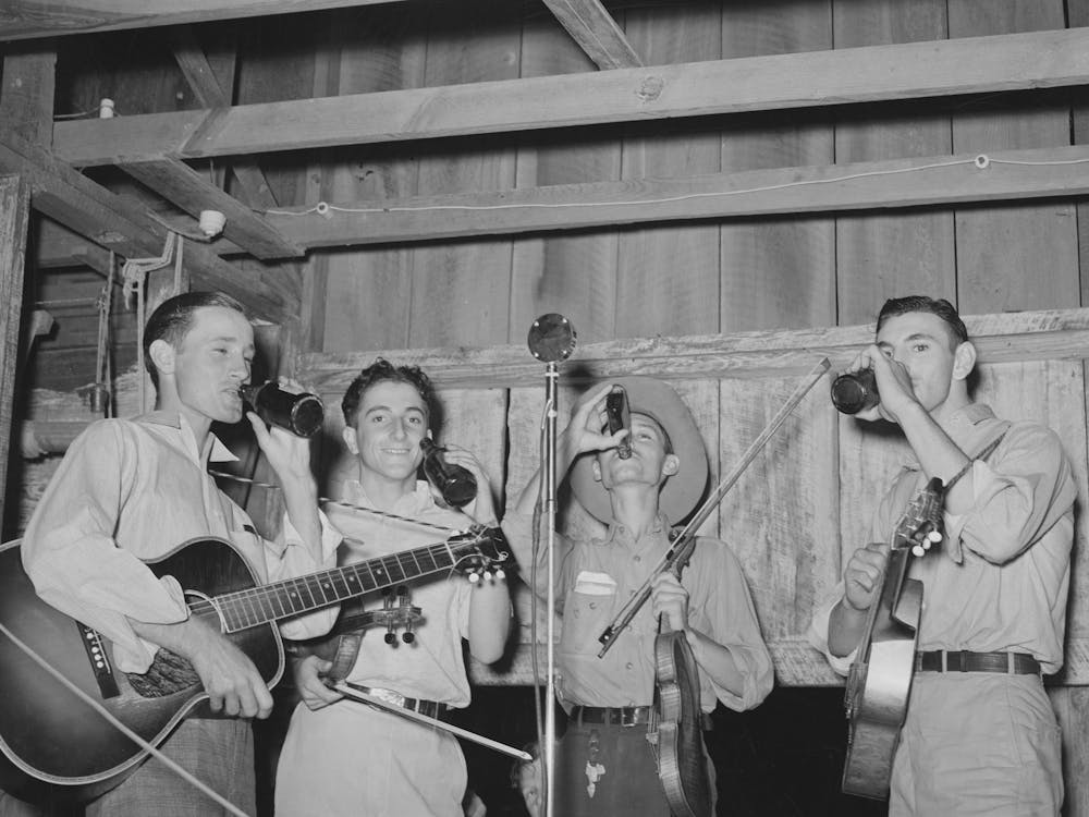 Cajun Orchestra For Fais Do Do Near Crowley, Louisiana, Having Intermission With Drinks By Russell Lee