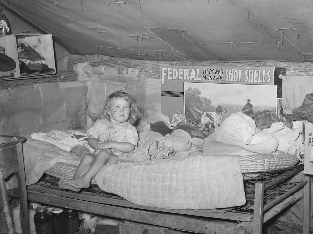 Child Sitting On Bed In Tent Home Near Sallisaw, Oklahoma, Sequoyah County By Russell Lee