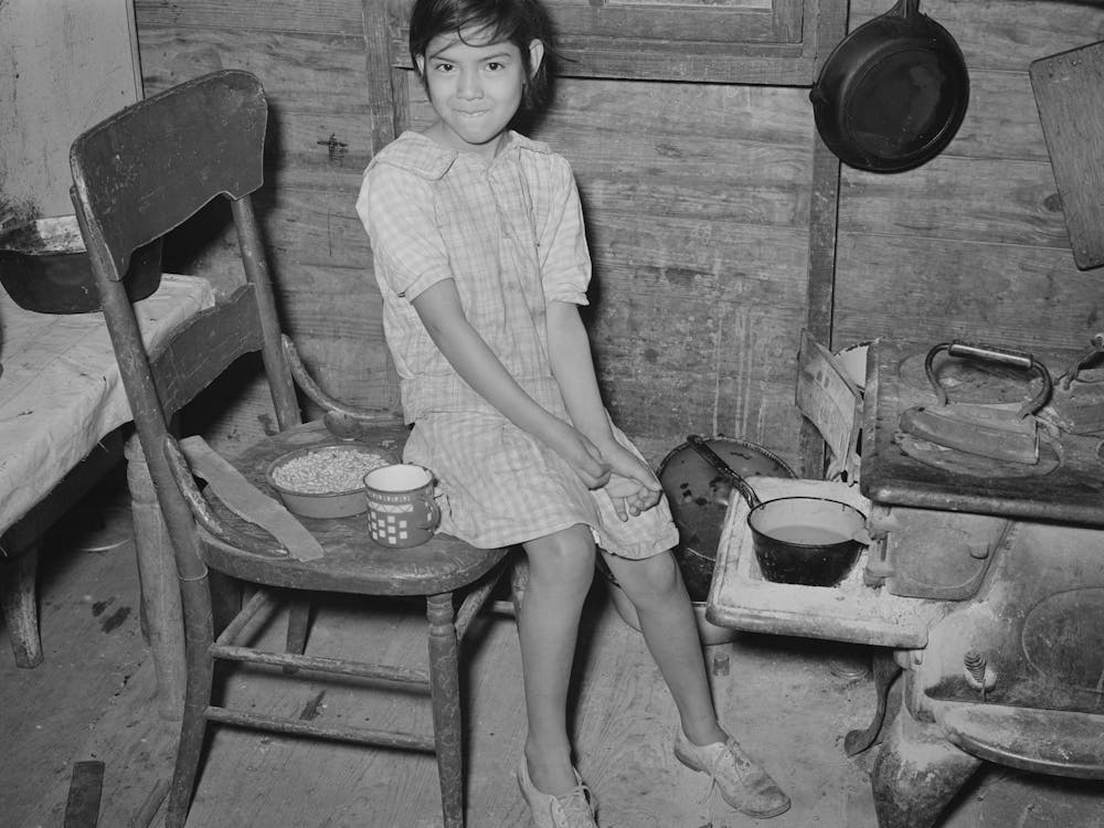 Untitled Photo, Possibly Related To Mexican Child With Dried Beans Which Play A Large Part In The Mexican Diet