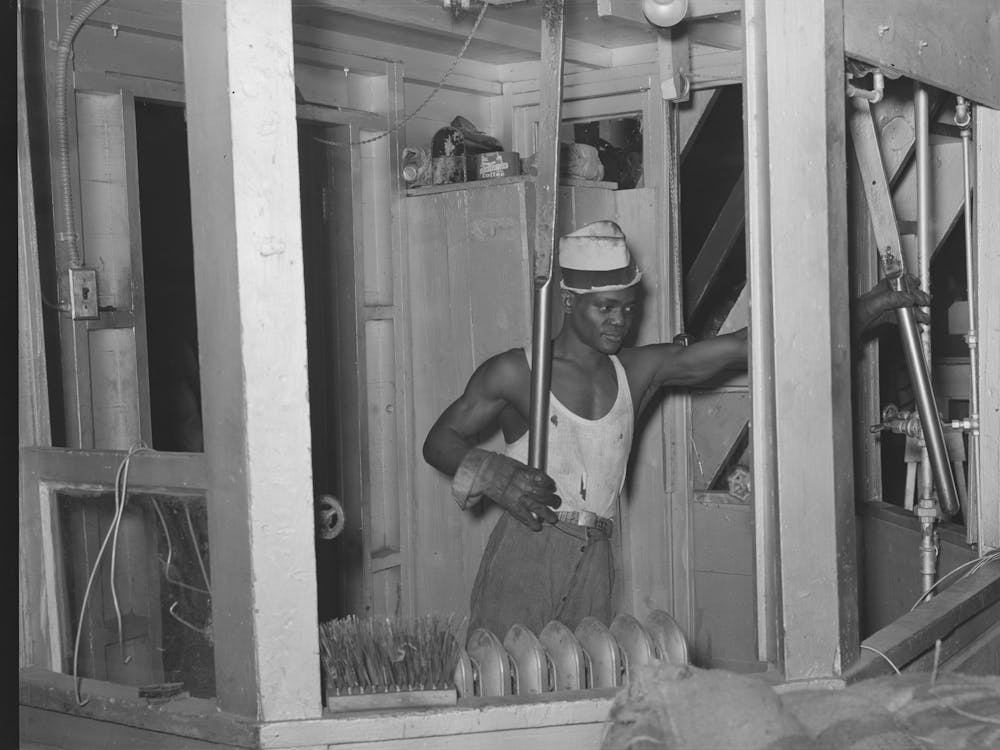 Compressing Unit Operator, Compress, Houston, Texas By Russell Lee