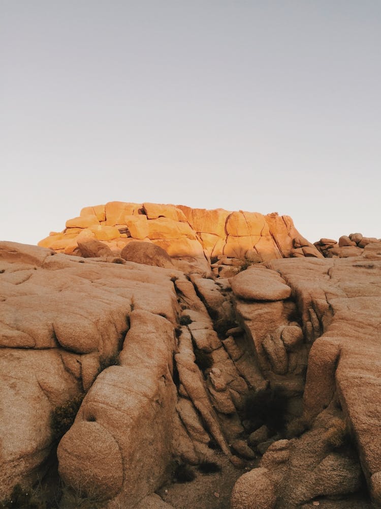 Desert Sunrise Over Boulders