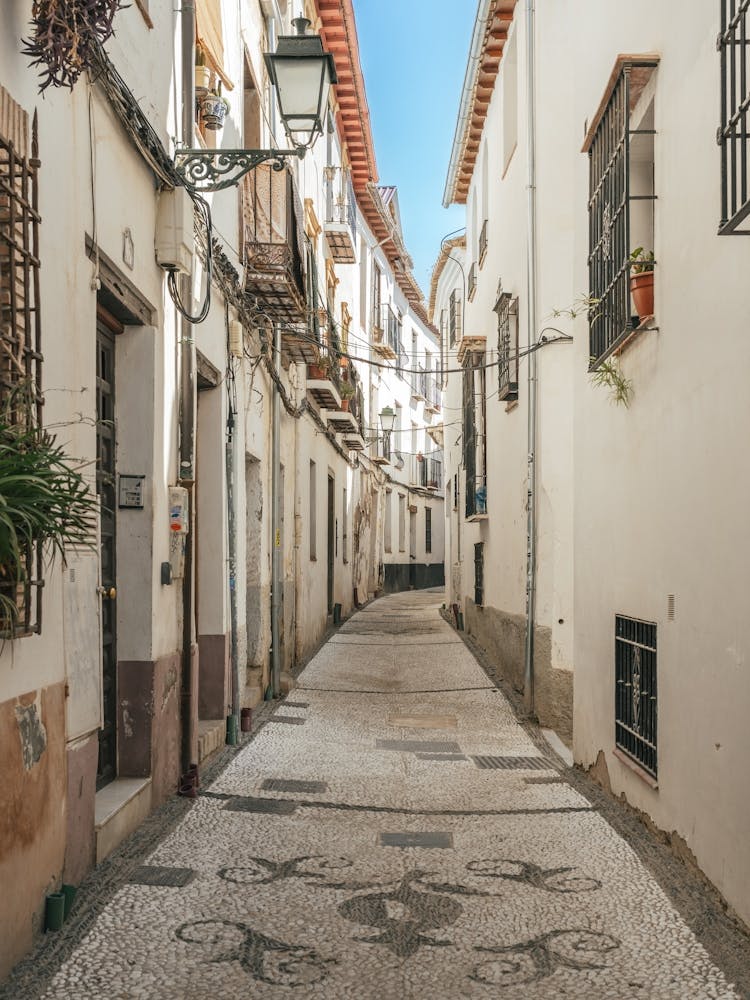 Narrow Street In Granada, Spain
