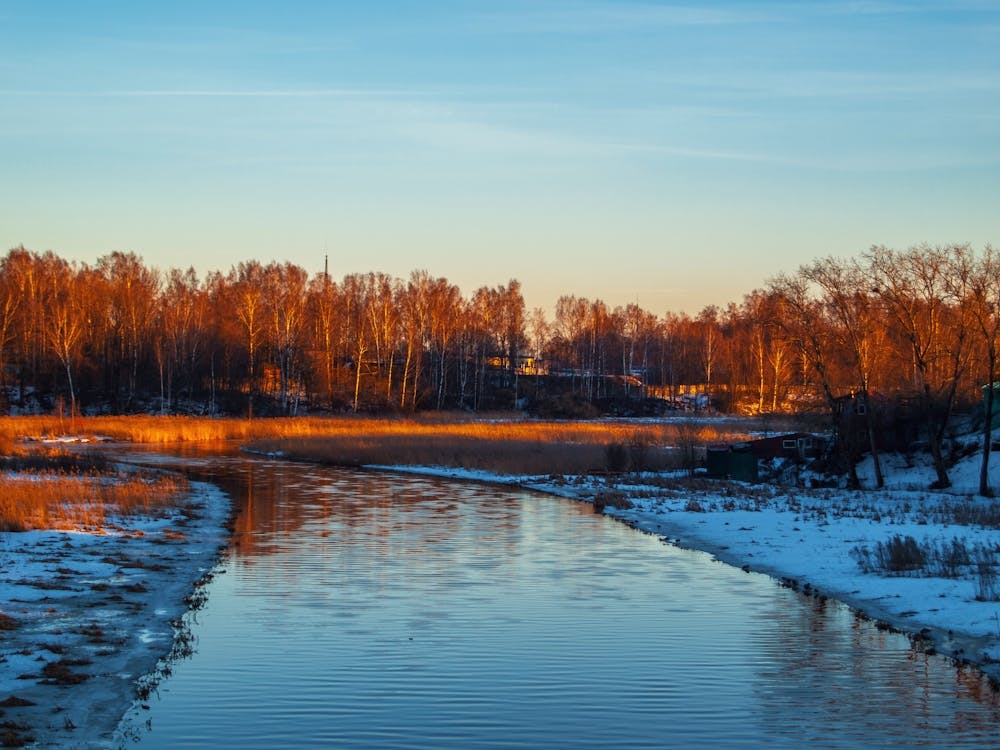 Sunrise Over A Frozen River