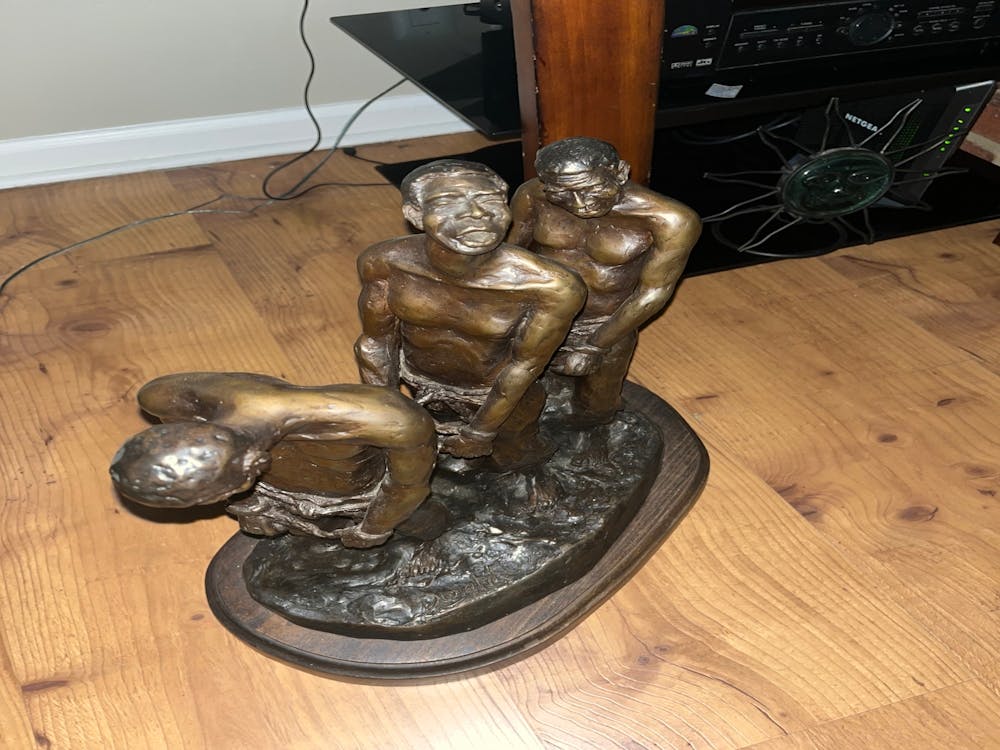 Bronze Statue Of Three Men