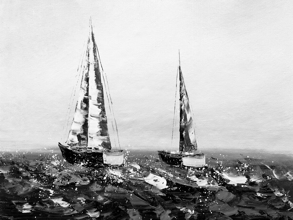 Two Sailboats In The Ocean