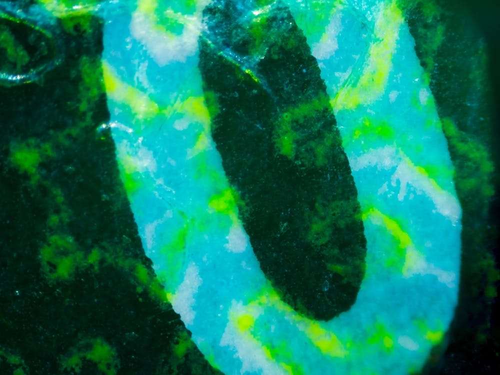 Embedded Digit 0 On Israeli Money Bill Of 50 Shekel Under The Microscope