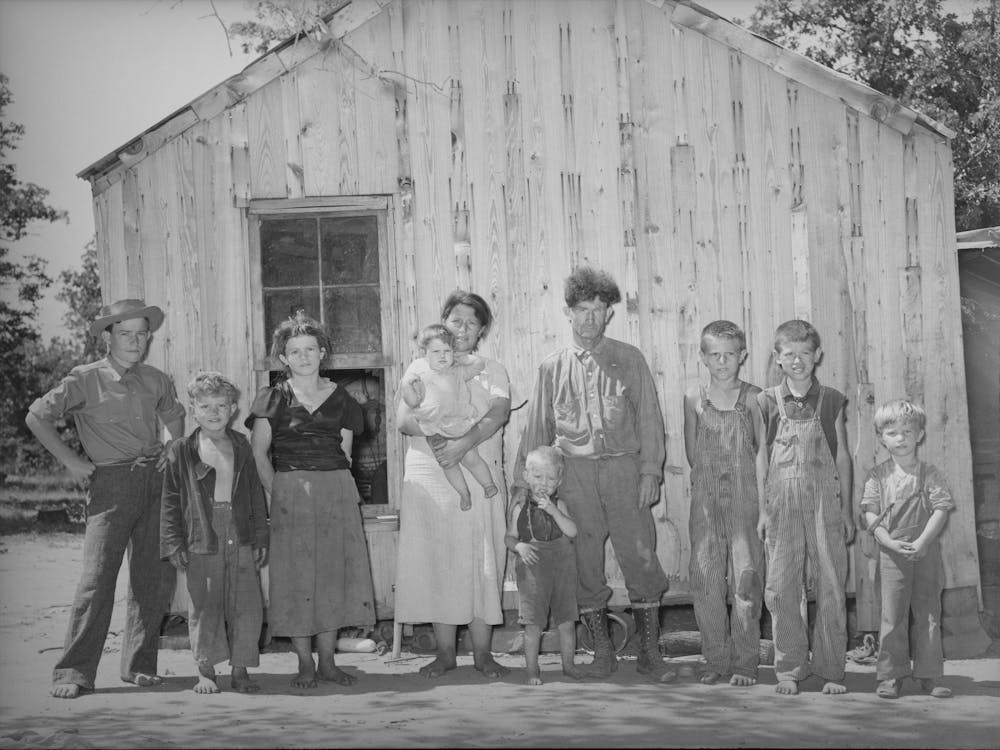 Family Of Agricultural Day Laborer, Former Oil Worker And Coal Miner,The Family Lives In This Two Room Shack In Mcintos