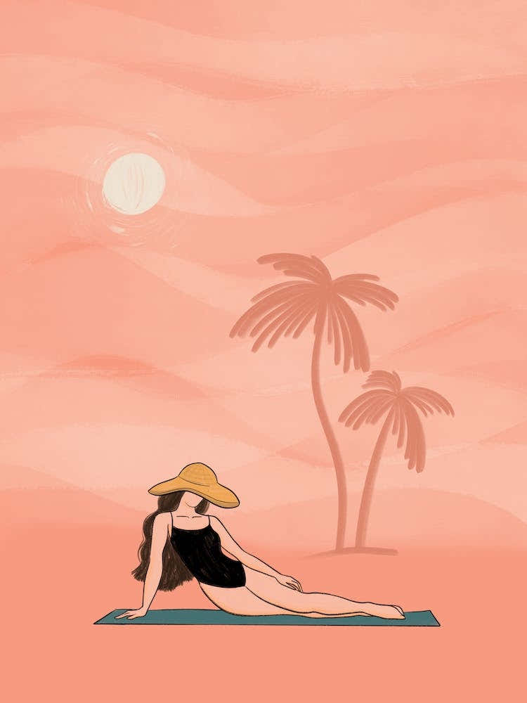 Woman Relaxing On A Beach