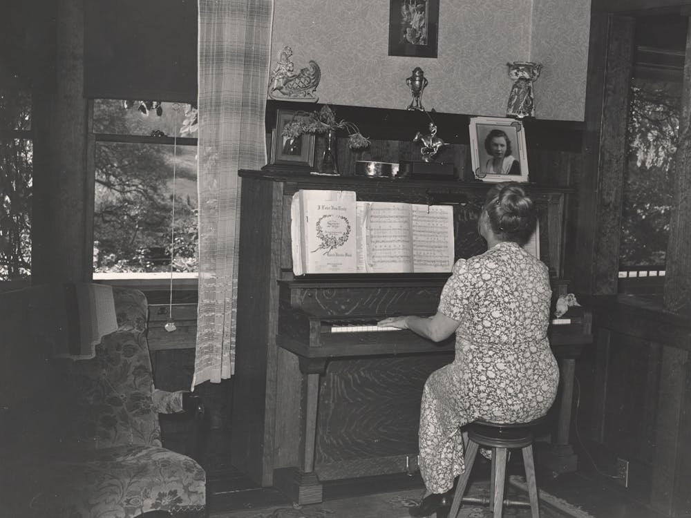 Fruit Farmer S Wife Playing Piano, Placer County, California By Russell Lee