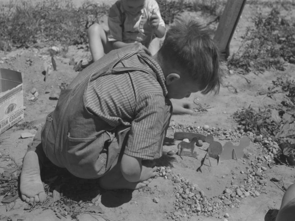 Son Of The Farm Worker At The Fsa (Farm Security Administration) Labor Camp Caldwell, Idaho By Russell Lee