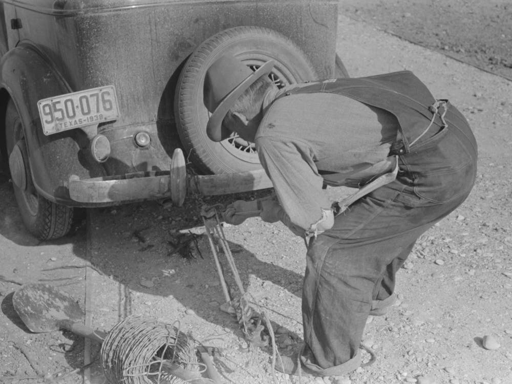 Mr,Milton, Farmer At El Indio, Stretching Barbed Wire By Means Of Block And Tackle Attached To Automobile By Russ