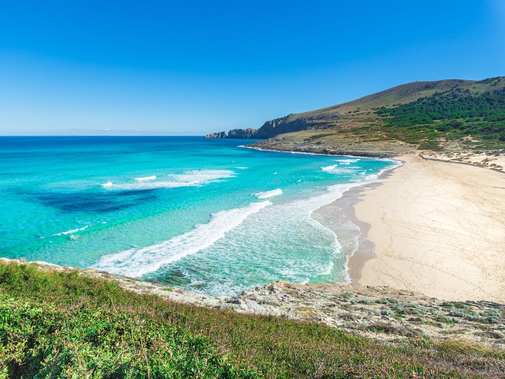 Beautiful sand beach on Majorca, coast bay of Cala Mesquida in Cala Ratjada, Spain, Mediterranean Sea, Mallorca island
