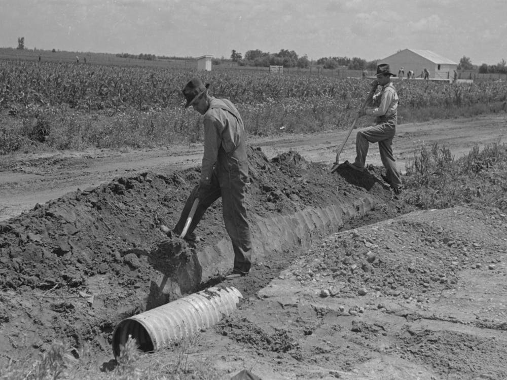 Untitled Photo, Possibly Related To Southeast Missouri Farms Project, Fitting Culvert Between Main Road And